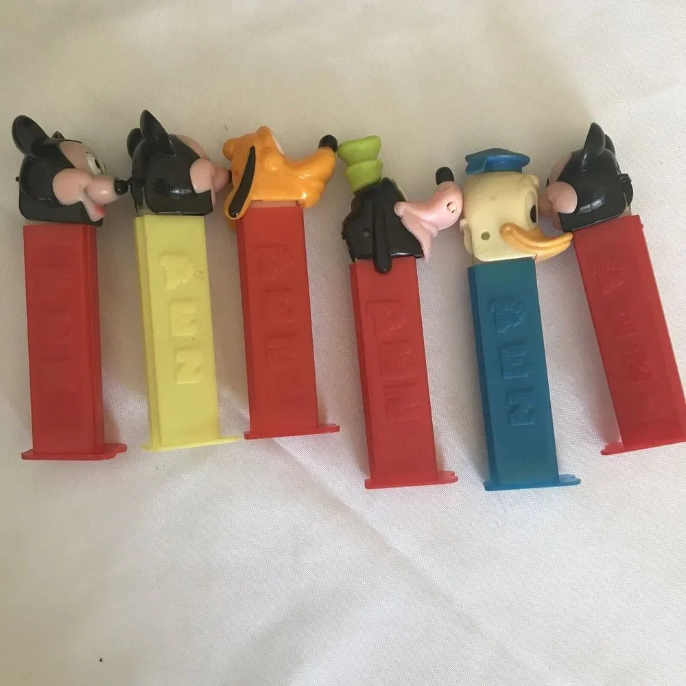 PEZ Dispensers Lot of 21 PEANUTS, DISNEY GARFIELD, SANTAS, LAMB AND‎ MORE